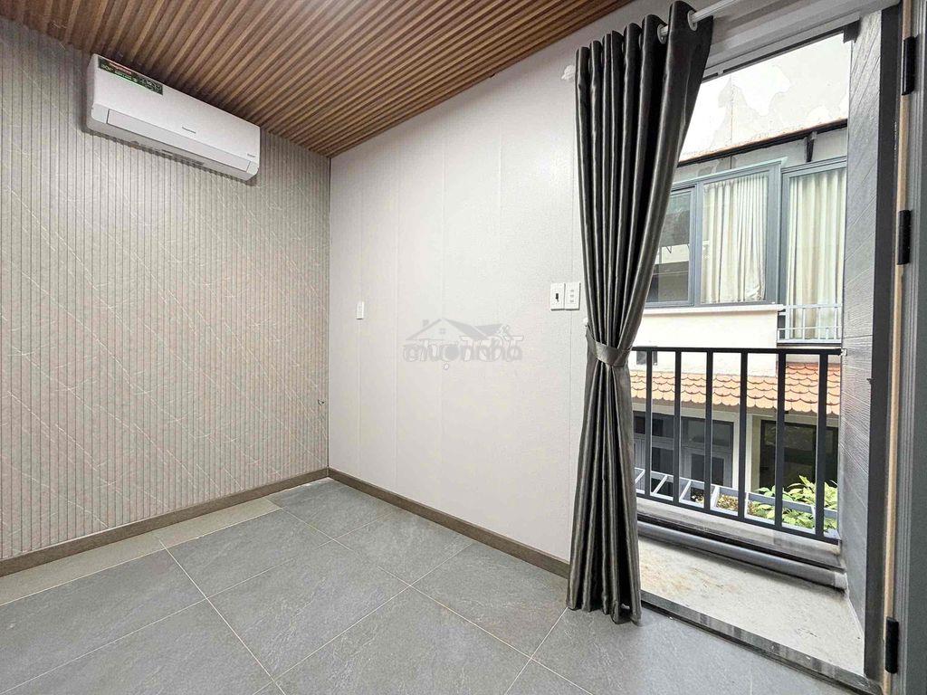 Cho thuê căn hộ 2pn1wc ban công thang máy full nt mới ở bàn cờ quận 3 - 2