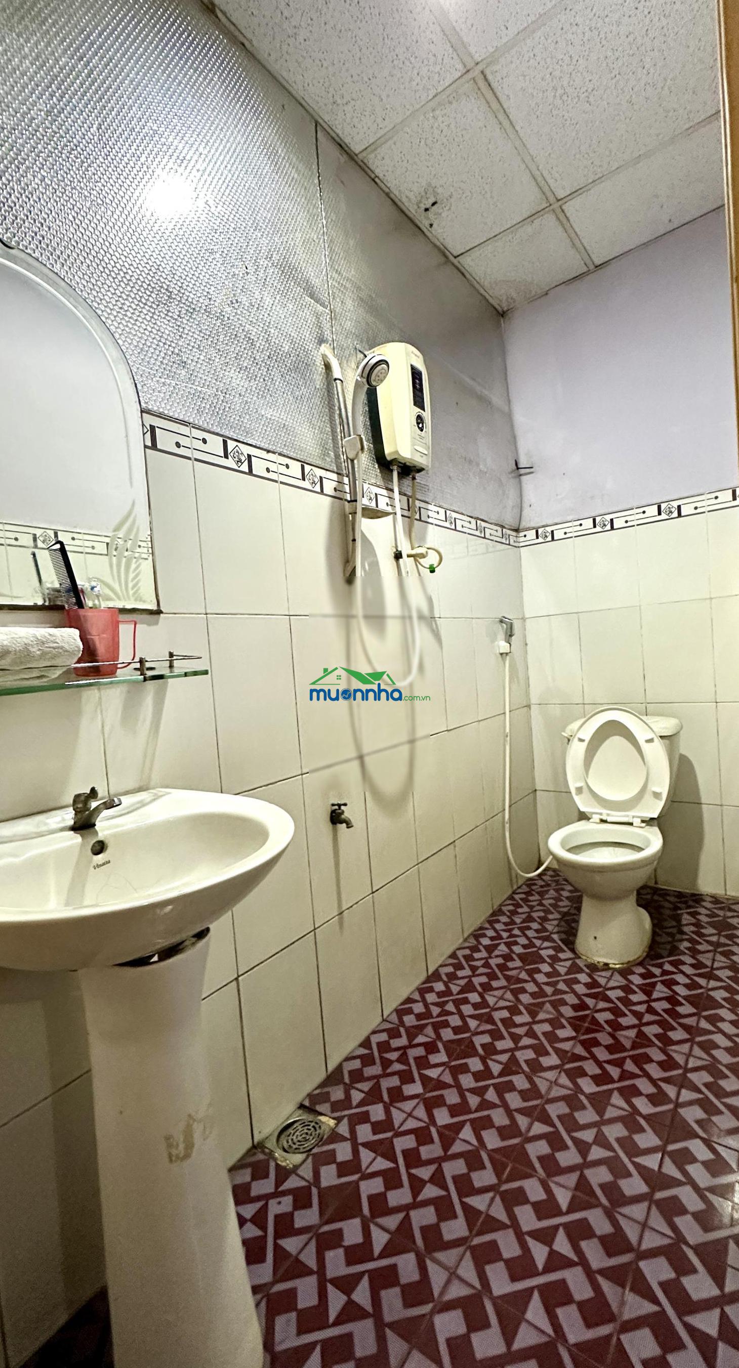Bán đất - tặng nhà đường trần thị cẩm. có 14 phòng cho thuê. shr - 3
