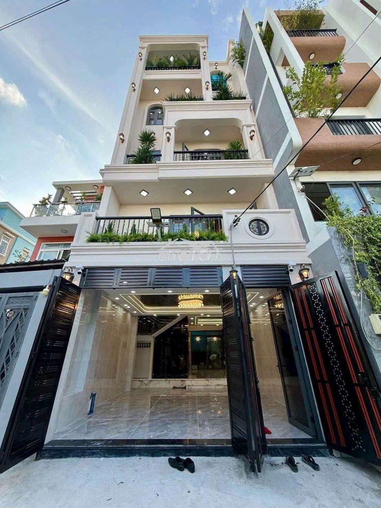 Siêu phẩm đẹp mê 5,5m x 16m. 4 tầng thang máy hẻm 8m thông hà huy giáp