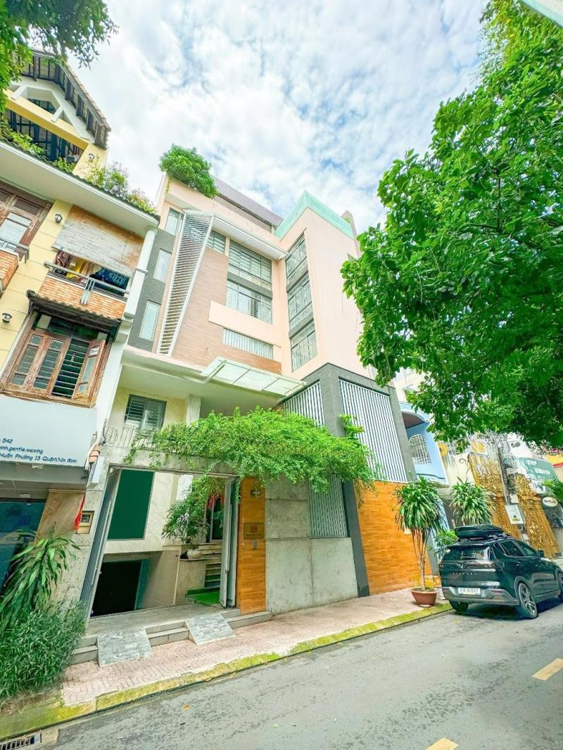 Tòa nhà 8 tầng - gần cổng t3 - lê văn huân - tân bình - dt: 12.5*16m (195m2) - 69 tỷ - 2