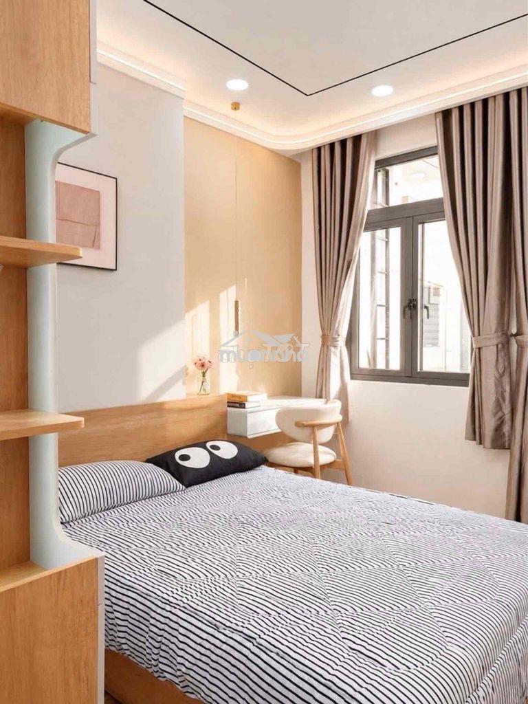 Phú nhuận - dt:40 m2-5 phút ra q.1 - hẻm thông - 2 tầng - 3pn (pn trệt - 2