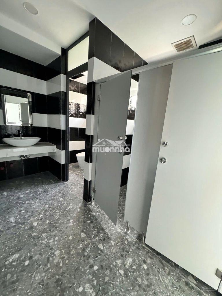 Tòa nhà văn phòng đường lê trung nghĩa. khu k300.  8x20m. hầm - 5 tầng - 2