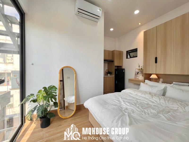 Nguyễn kiệm, p hạnh thông, gv studio cửa sổ, full nội thất tone gỗ hiện đại gần cv gia định