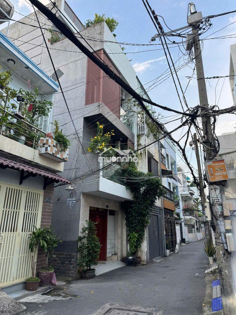 Sát công viên gia định dt (4x15m) 1 trệt 2 lầu st 4pn hẻm xe hơi 